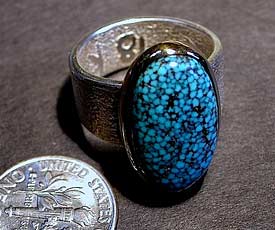 Navajo Artist Darryl Dean Begay's Sterling Silver Tufa Ring with an 18kt Gold Bezel
